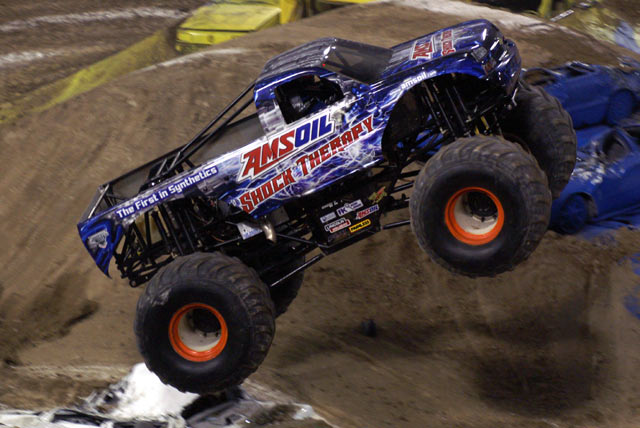 Shock Therapy Monster Truck rearing up in the air like a bold stallion